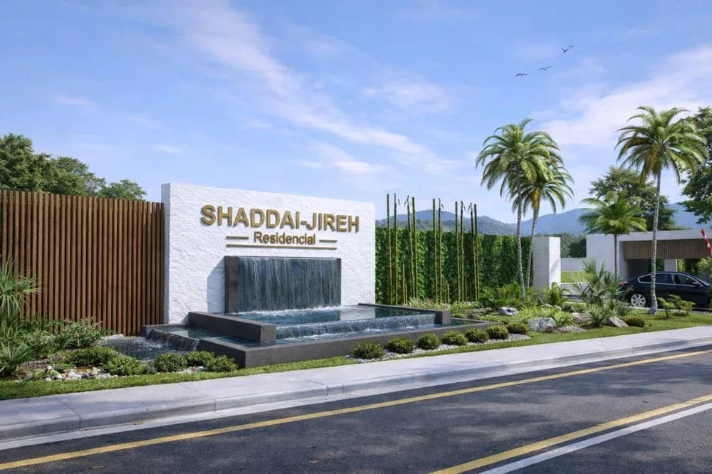 Entrada principal de Shaddai-Jireh Residencial con cascada