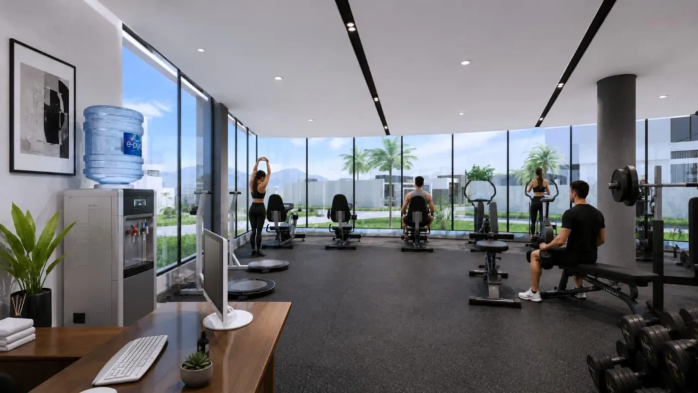 Recepción y zona de cardio del gimnasio