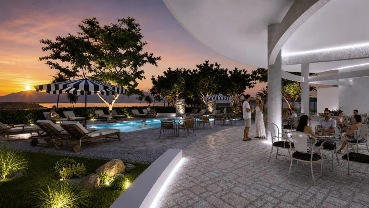 The pool and terrace at sunset, looking out to the horizon
